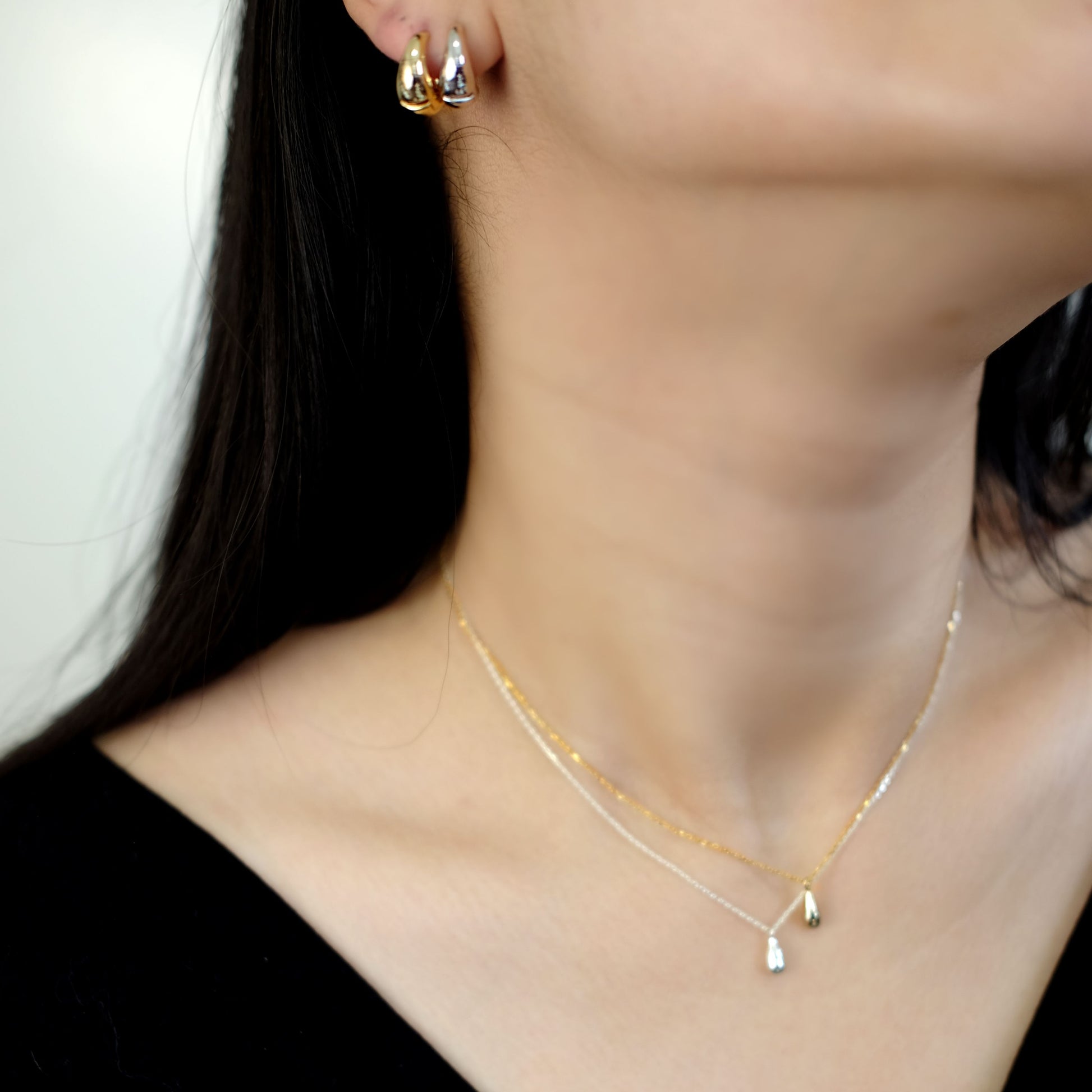 everyday minimal dainty jewelry dalhaejewelry timeless style capsule wardrobe staple minimalist fashion staple fine sterling silver gold vermeil teardrop necklace huggie hoop earrings