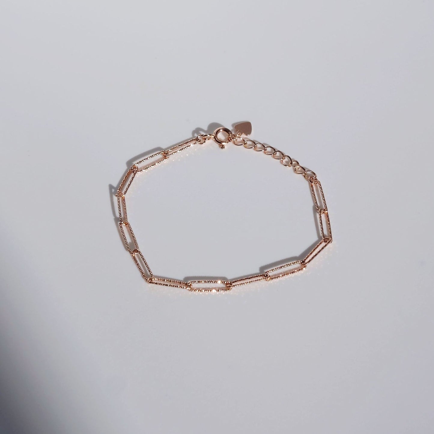 everyday minimal dainty jewelry dalhaejewelry timeless style capsule wardrobe staple minimalist fashion staple luxe link bracelet diamond cut sterling silver rosegold