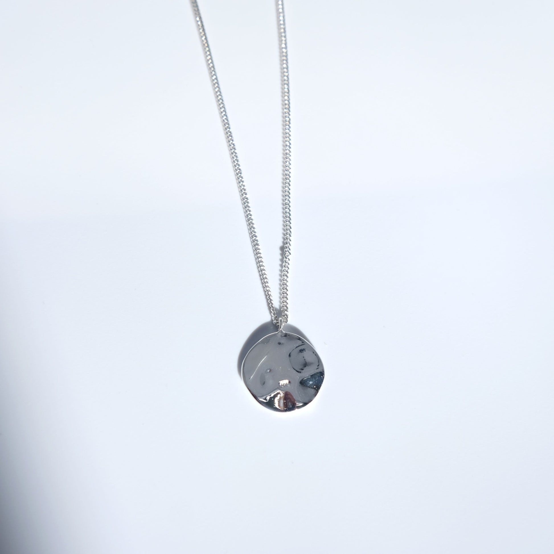 everyday minimal dainty jewelry dalhaejewelry timeless style capsule wardrobe staple minimalist fashion staple pendant necklace hammered moon smooth polish sterling silver