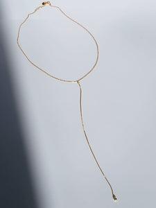 everyday minimal dainty jewelry dalhaejewelry timeless style capsule wardrobe staple minimalist fashion staple lariat long necklace ball drop sleek chic sterling silver gold vermeil 