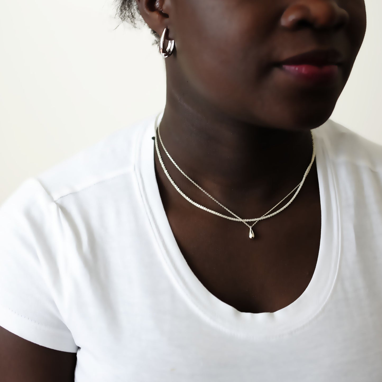 everyday minimal dainty jewelry dalhaejewelry timeless style capsule wardrobe staple minimalist fashion staple fine sterling silver gold vermeil teardrop earrings huggie hoop