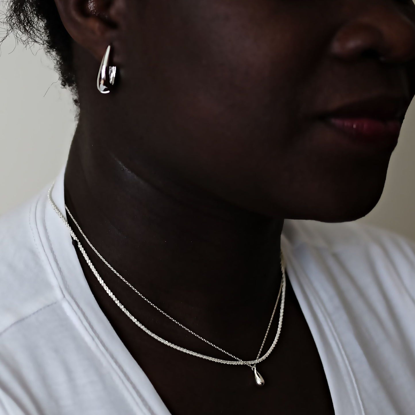 everyday minimal dainty jewelry dalhaejewelry timeless style capsule wardrobe staple minimalist fashion staple fine sterling silver gold vermeil teardrop earrings huggie hoop