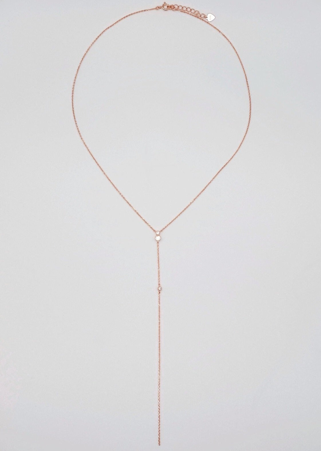 everyday minimal dainty jewelry dalhaejewelry timeless style capsule wardrobe staple minimalist fashion staple fine sterling silver gold vermeil diamond long lariat necklace romantic rosegold diamond necklace